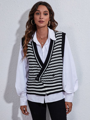 Double-breasted black and white stripe knit vest with V-neck and button detail.