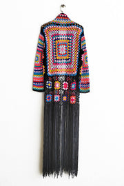 Granny square crochet duster with fringe in multicolor and black, open front, long sleeve, boho style.