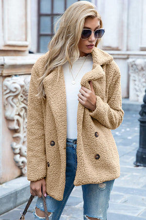 Camel teddy pea coat with double-breasted buttons and notched lapels.
