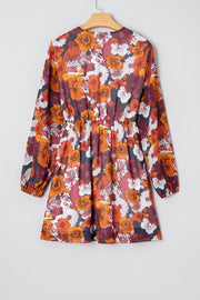 Floral wrap mini dress with puff sleeves in autumnal floral print.