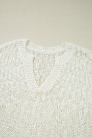 Beige textured knit V-neck shell top with ribbed neckline and cuffs
