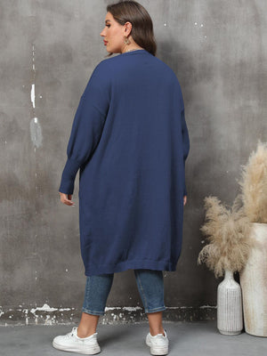 Oversized dark blue knit duster cardigan with long sleeves and ribbed cuffs.
