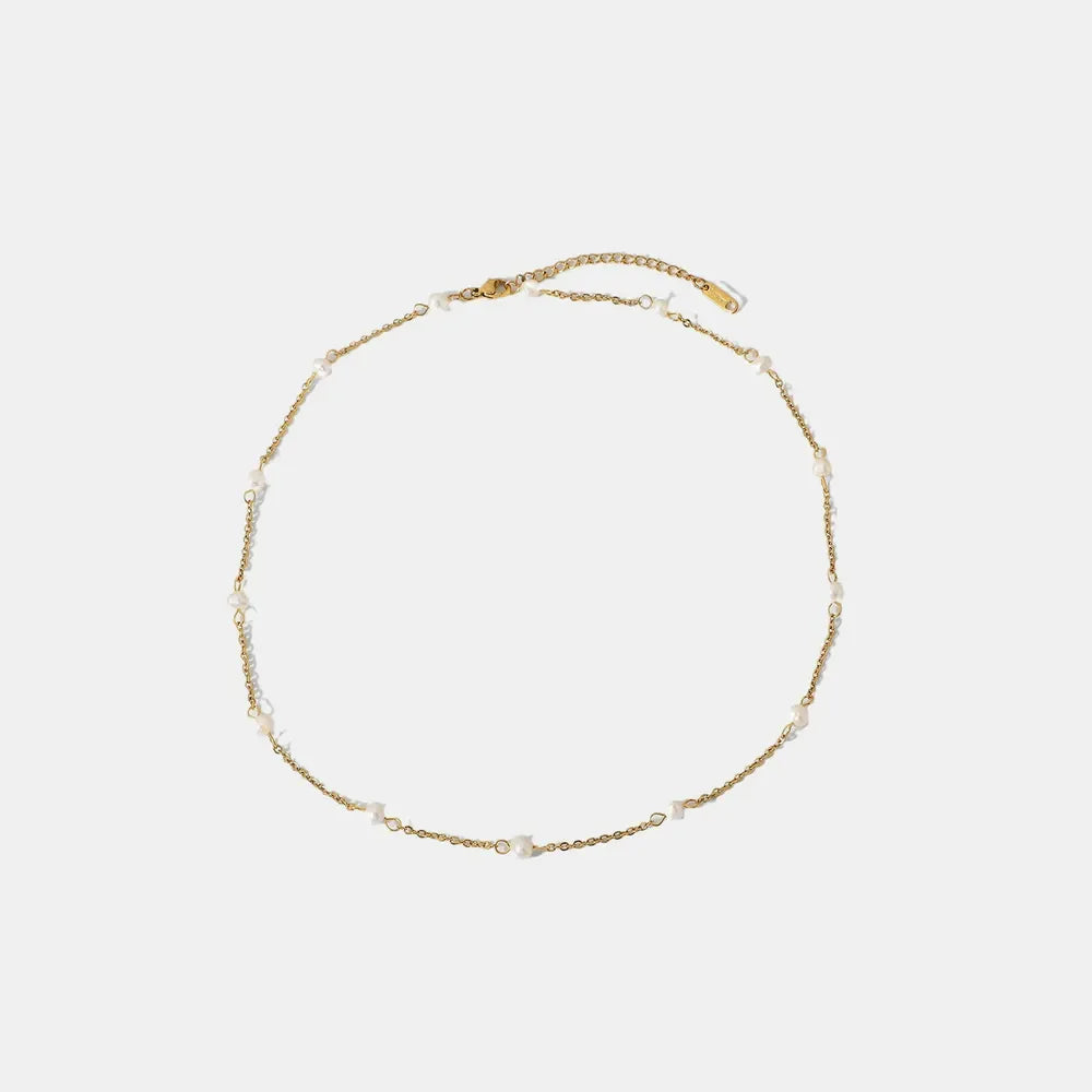 Gold chain necklace with small pearls, delicate and elegant for women.