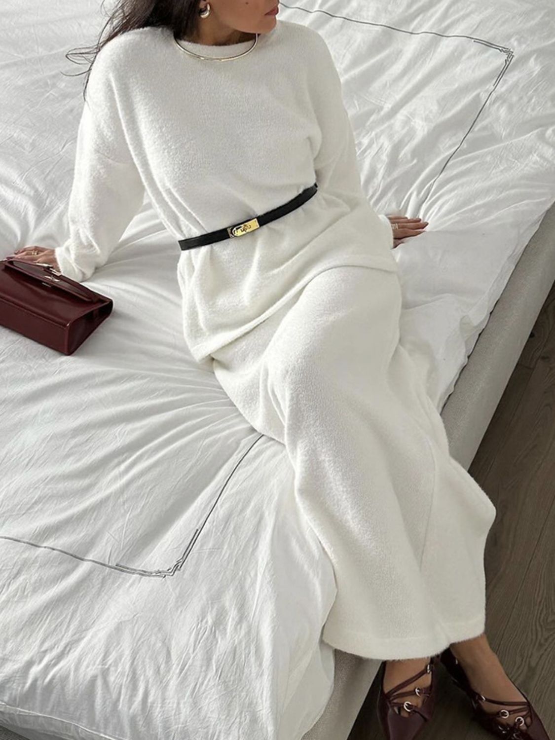 White textured knit co-ord set with relaxed silhouette, long sleeves, and crew neck.
