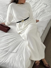 White textured knit co-ord set with relaxed silhouette, long sleeves, and crew neck.