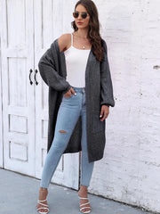 Charcoal ribbed knit maxi cardigan with pockets and balloon sleeves.