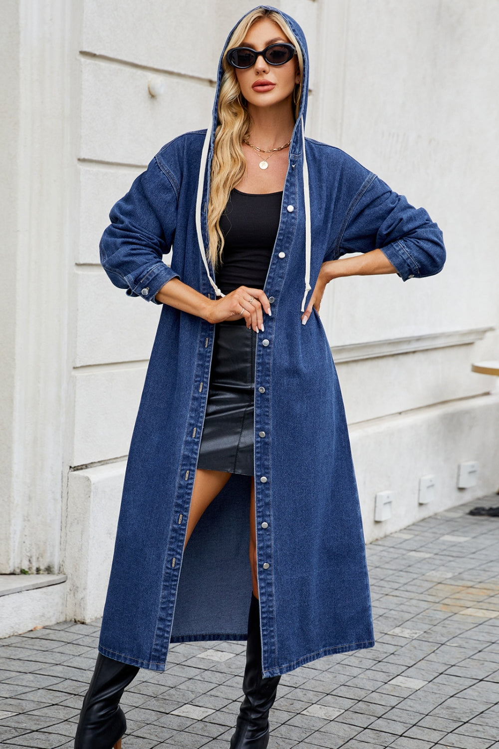 Denim maxi shirtdress in dark blue with hood and white drawstring, button-down front.
