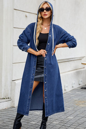 Denim maxi shirtdress in dark blue with hood and white drawstring, button-down front.