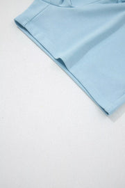 Light blue cotton bikini bottoms with drawstring details and crew neck style.