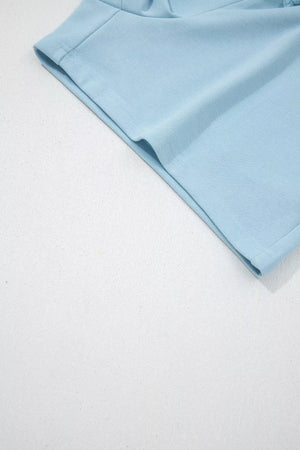 Light blue cotton bikini bottoms with drawstring details and crew neck style.