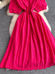 Lace-embellished A-line midi dress in pink with puff sleeves and button detail