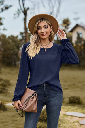 Dark Navy waffle knit blouse with perforated yoke and ruffled cuffs