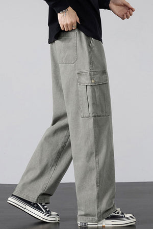 Gray relaxed fit cargo sweatpants with drawstring and buttoned flap pocket.