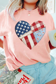 Pink t-shirt with a patriotic heart graphic made of patchwork American flag and gingham patterns.