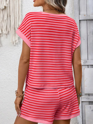 Relaxed pink and red striped loungewear set with short sleeves and shorts.
