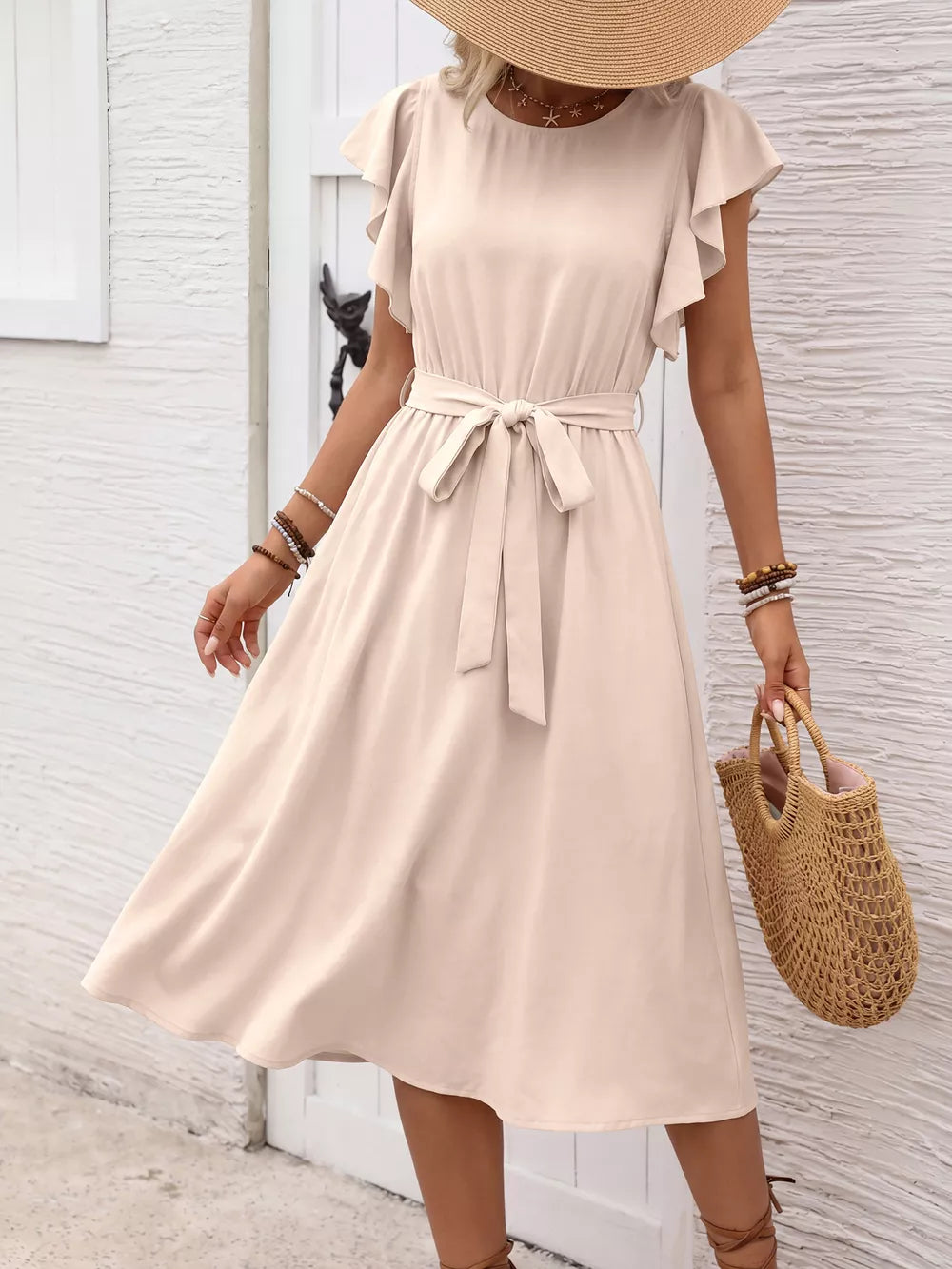Beige midi dress with ruffled sleeves, tie waist, and button-down front.