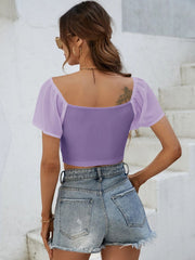 Purple ribbed crop top with sheer chiffon sleeves and square neckline.