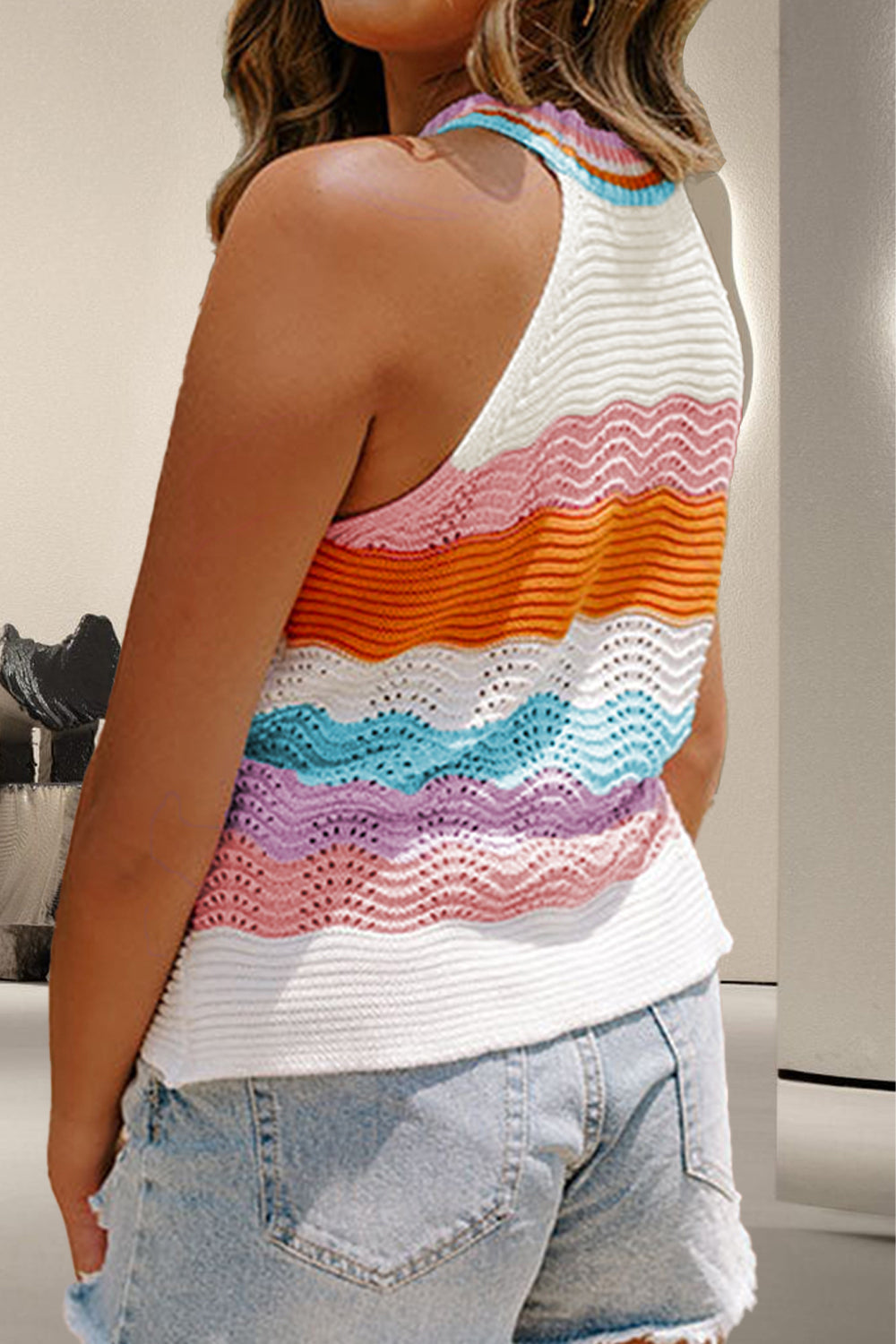 Wavy knit halterneck top with multicolor stripes and openwork detail