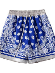 Royal blue bandana print sport shorts with metallic trim and drawstring waist.