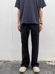 Men's black sweatpants with a relaxed fit and drawstring waist.