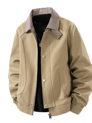 Khaki zip-up jacket with plaid collar and button details.