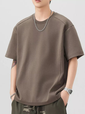 Oversized brown cotton blend t-shirt with crew neck and short sleeves.