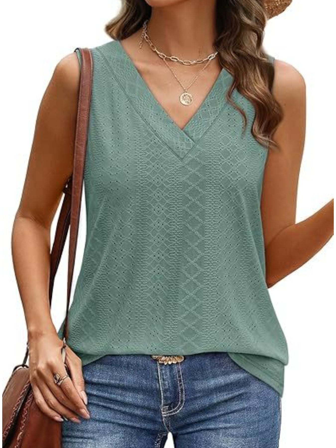 Sleeveless V-neck tank top in a muted green with allover eyelet texture.