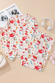 White collared pajama set with festive holiday print of mugs, gifts, and cookies.