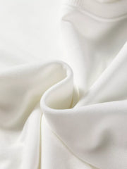 White loungewear top fabric detail, soft knit texture