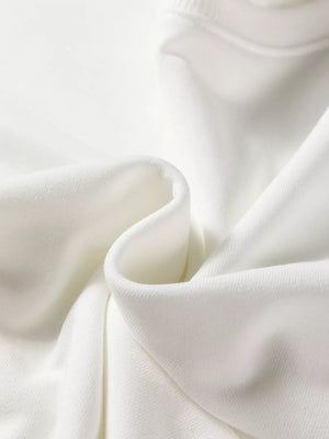 White loungewear top fabric detail, soft knit texture