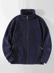 Navy fleece lined full zip sweatshirt with faux fur collar and orange zipper accents.