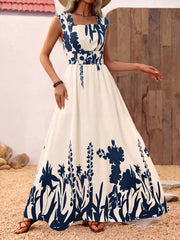 Botanical print maxi dress with square neck, cap sleeves, and cinched waist.