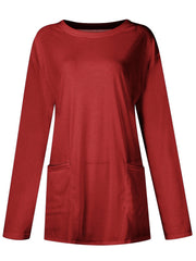 Relaxed fit tunic in Deep Red with crew neck, long sleeves, and two patch pockets.