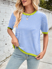 Striped knit tee with blue and white stripes and neon green trim.