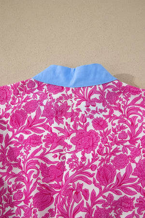 Vibrant floral midi dress with a blue collar and pink floral pattern.