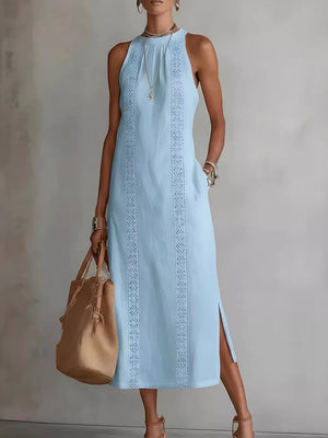 Sky blue sleeveless midi dress with geometric trim and pockets.