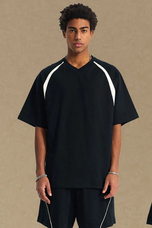 Black V-neck raglan tee with white contrast shoulder details