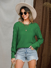 Green diamond-cut raglan knit sweater with textured sleeves and a crew neck.