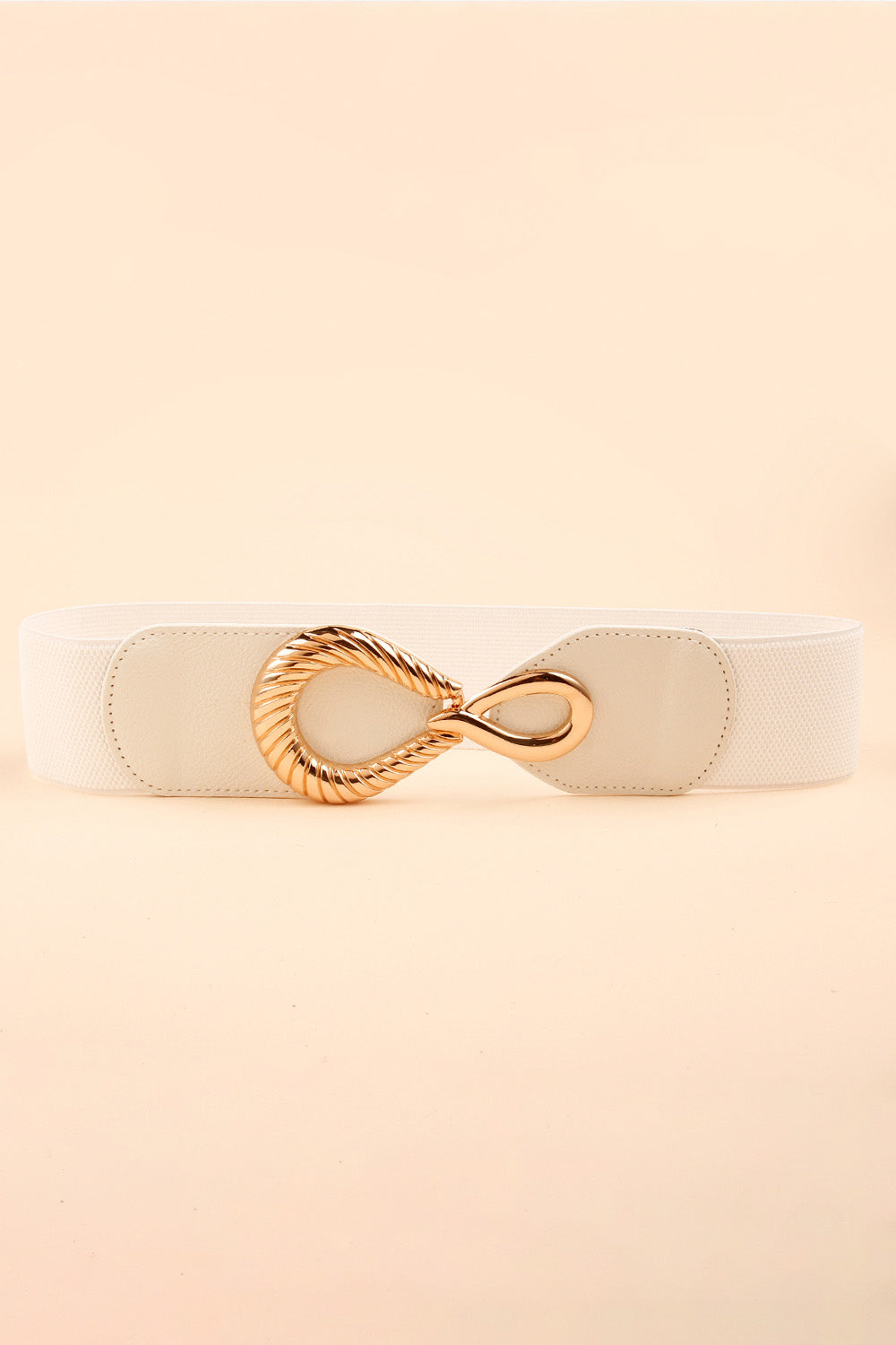 White elasticated waist belt with a sculpted gold buckle and faux leather detail