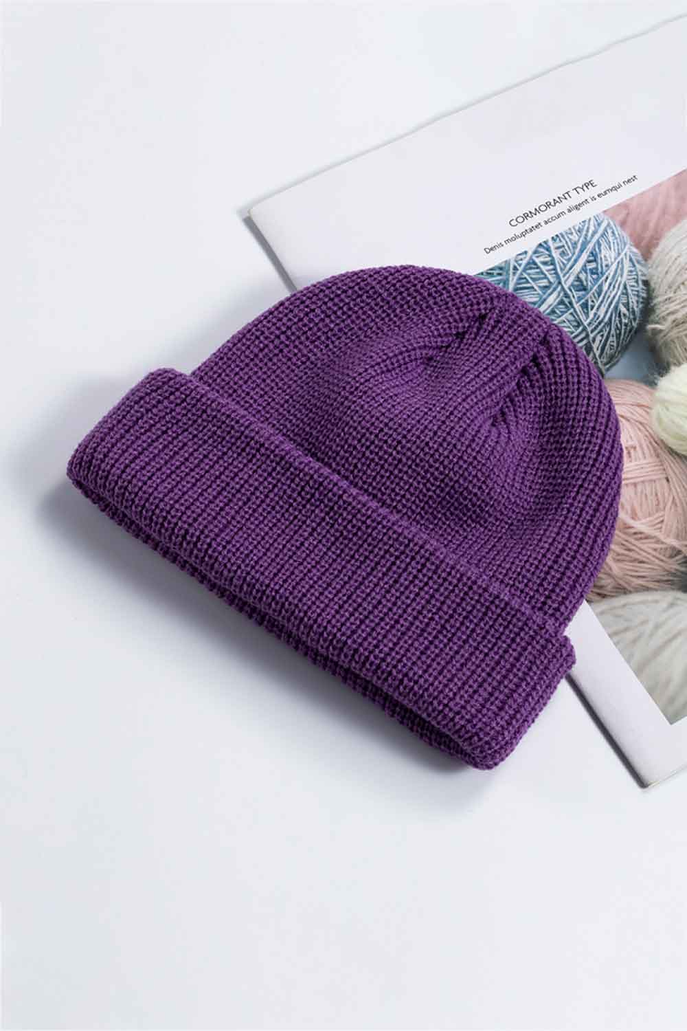Purple ribbed knit beanie with a turn-up cuff