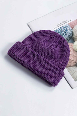 Purple ribbed knit beanie with a turn-up cuff