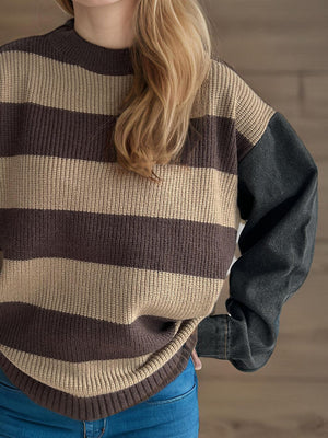 Brown and tan striped knit sweater with black denim sleeves and crew neck.
