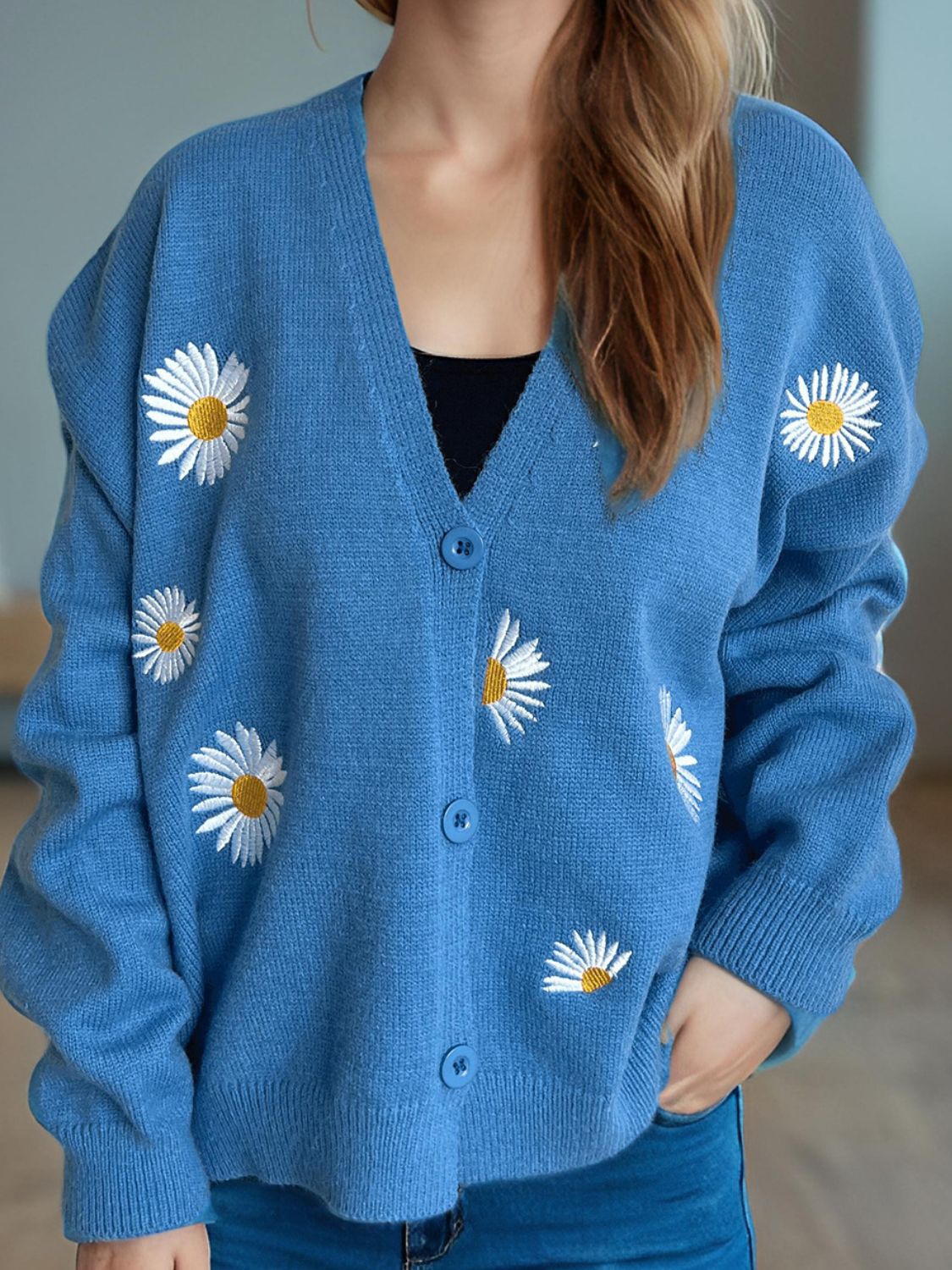 Sky blue oversized knit cardigan with daisy embroidery and buttons