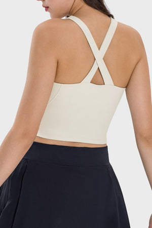 Cream Keyhole Halter Cami Top with criss-cross back straps.