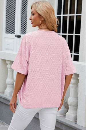 Blush pink open-front crochet kimono sleeve top with allover geometric pattern.