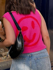 Knit smiley face tank top in hot pink with red graphic detail.