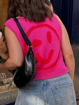 Knit smiley face tank top in hot pink with red graphic detail.