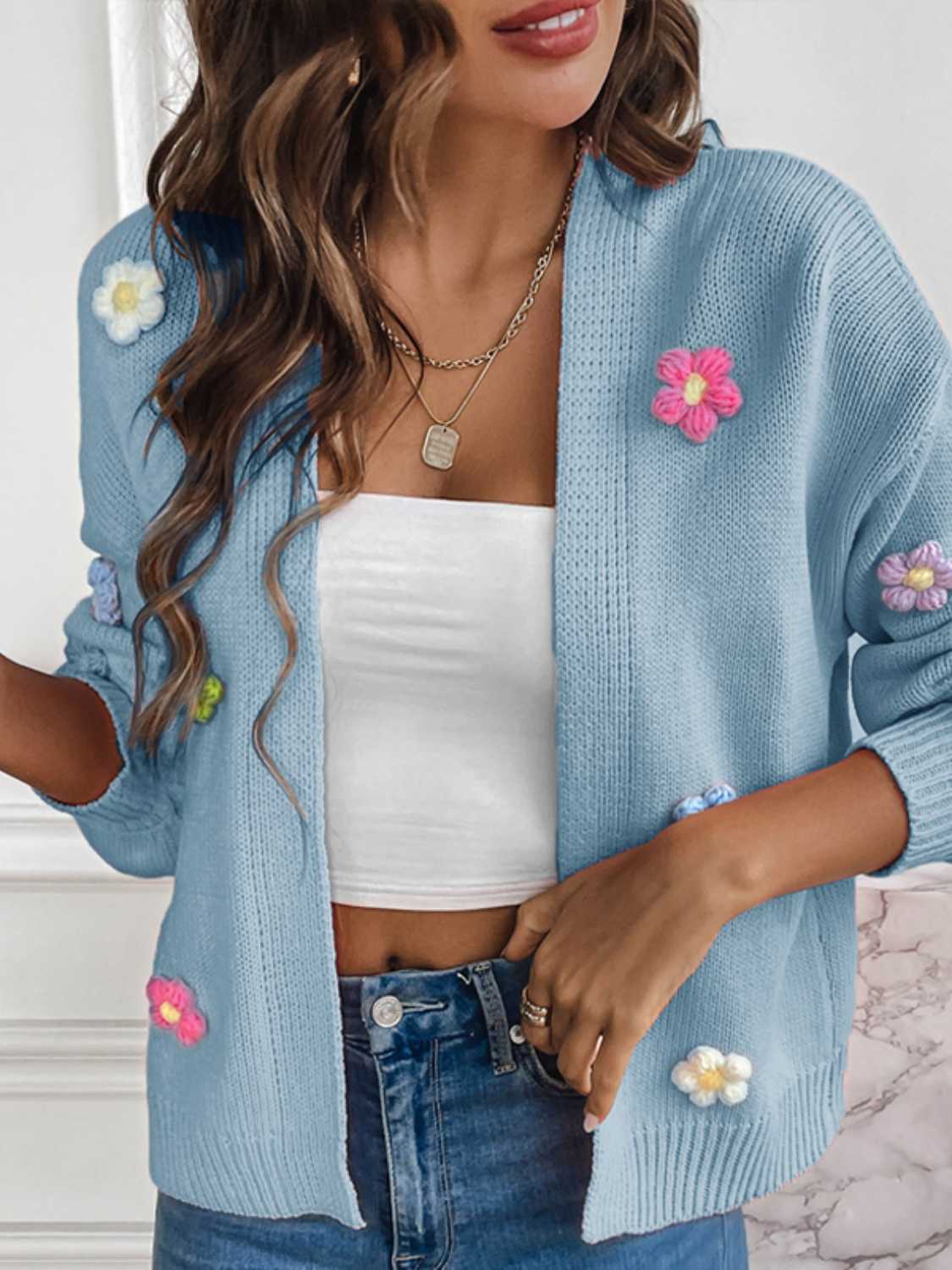 Light blue knit cardigan with embroidered flowers, open front, casual style