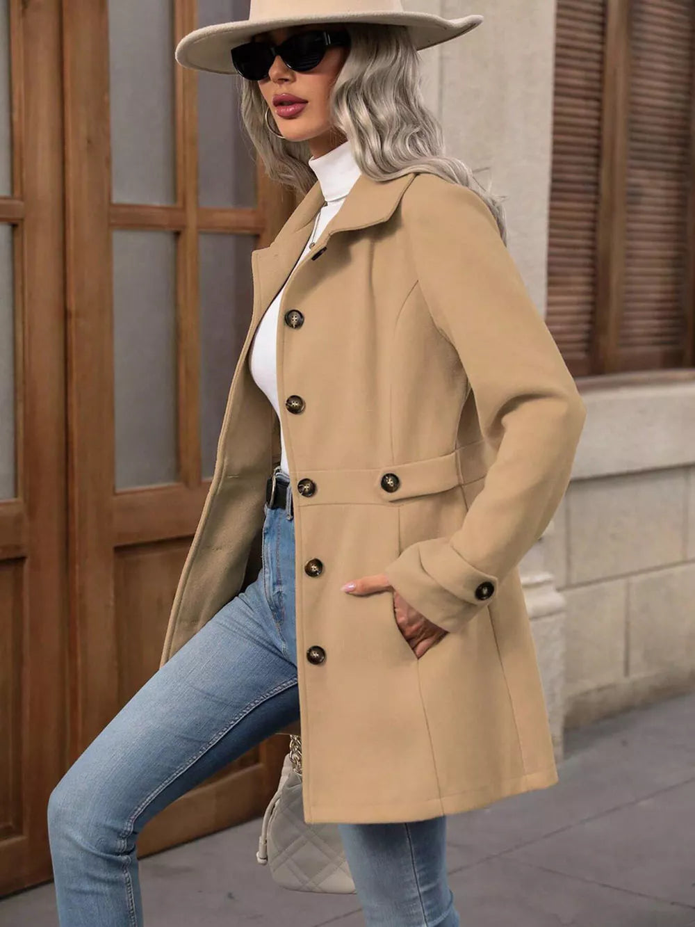 Camel button-up trench coat with cinched waist and button details.
