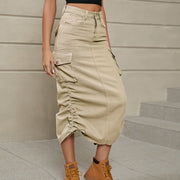 Sand cargo denim midi skirt with adjustable ruching and button-flap pockets.
